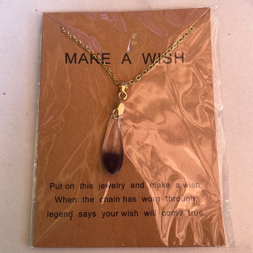 Make a wish charm necklace in gold.